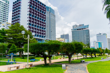 A city park in a seaside resort town. Filmed in October in Nha Trang, Vietnam in sunny weather in the city center. 