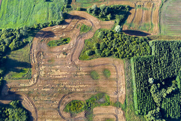 Crop fields, sinkholes and groves in nature park, aerial view - 539623209
