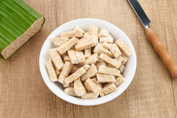 Raw Tempeh, Tempeh or Tempe, Indonesian traditional food, made from fermented soybeans. Usually fried for a side dish or for other cooking ingredients.

