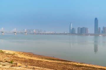 city skyline of business district downtown in daytime