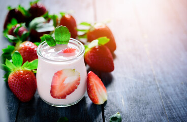 Healthy food of yogurt, Strawberry Yogurt,yogurt with fresh strawberry, wood background
