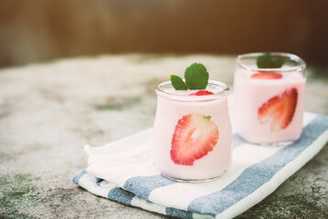 Healthy food of yogurt, Strawberry Yogurt,yogurt with fresh strawberry, wood background
