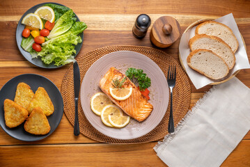 Salmon Steak, served with bread, ready to eat, Grilled Salmon with lemon.