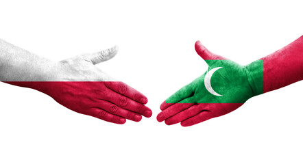 Handshake between Maldives and Poland flags painted on hands, isolated transparent image.