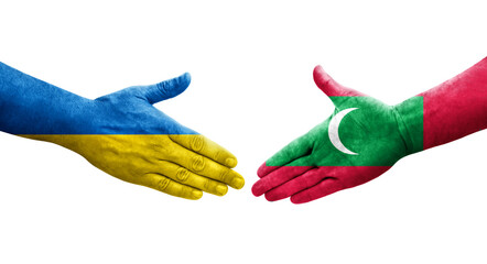 Handshake between Maldives and Ukraine flags painted on hands, isolated transparent image.