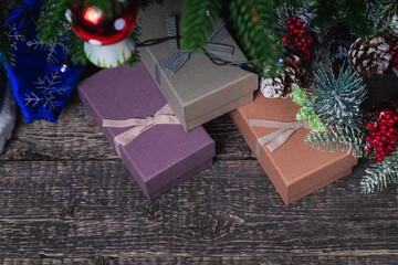 Christmas retro boxes with gifts under a decorated Christmas tree. New Year and Christmas