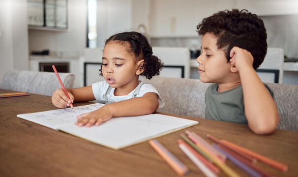 Creative, family and children drawing learning creativity from an education or artistic preschool project together in home. Girl, boy and siblings or kindergarten students color in picture in a book