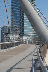 Clean modern minimalistic graphic architecture of high-rise skyscraper buildings, concrete stairs, steel bridges in urban cityscape skyline of San Diego, California