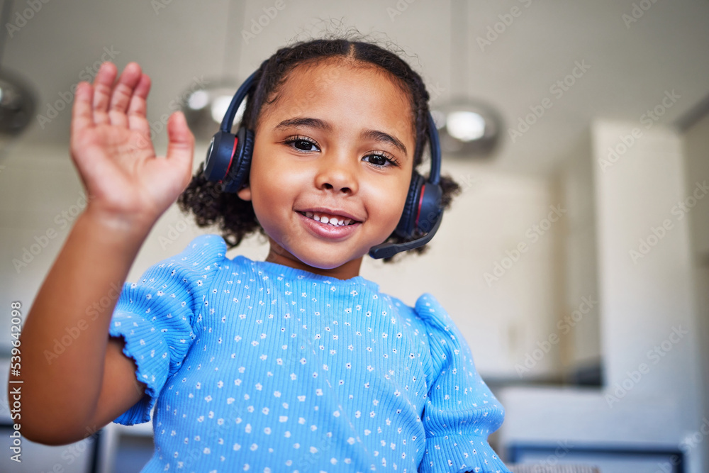 Poster children, school and video call with a girl wave on an internet chat, waving while using a headset f