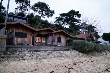 Obraz premium beach winter wooden fisherman wood house cabins on bassin Arcachon France