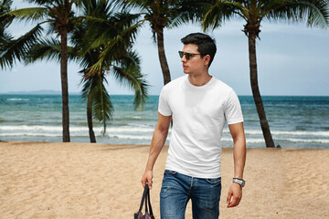 Men white t-shirt mockup with model beach background