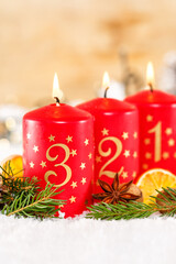 Third 3rd Sunday in advent with candle Christmas time decoration portrait format