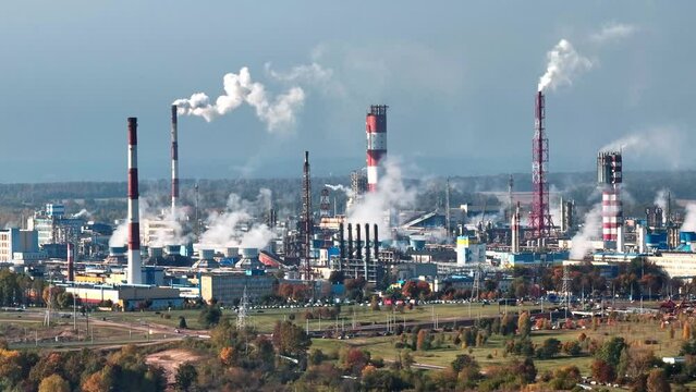 aerial view on smoked pipes of chemical enterprise plant. Air pollution concept. Industrial landscape environmental pollution waste of thermal power plant