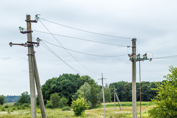 Electric power pole with wire close-up. Wire line in electrical resistance of power supply for residential buildings