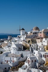 Townscape at oia with windmills in background - 539651636
