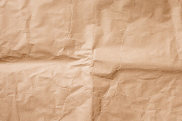 Crumpled cream craft paper. Background texture.