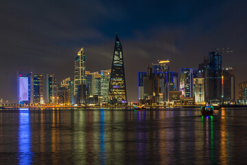 Naklejka premium The Panoramic skyline of Doha, Qatar after sunset