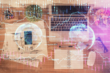 Multi exposure of financial chart drawing over table background with computer. Concept of research. Top view.