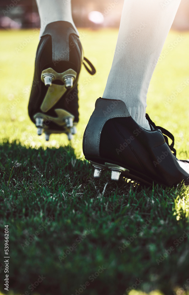 Sticker Soccer shoes, soccer player and soccer field by man for training, exercise and sports game. Football field, feet and football player shoe closeup with athletic guy walking getting ready for match