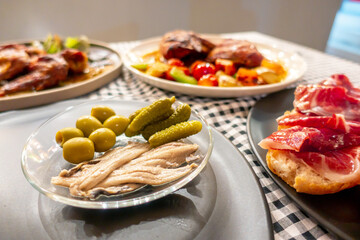 The closed up of European food such as chicken bread ham on table in restaurant. 