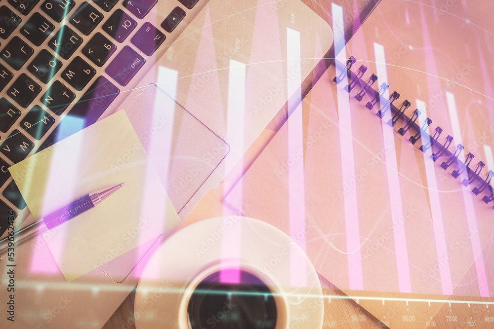 Aufkleber stock market graph and top view computer on the table background. double exposure. concept of financ