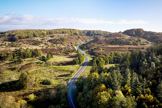 curvy road in rebild bakker in denmark
