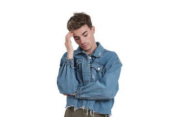 Young caucasian man sad, isolated on white background.