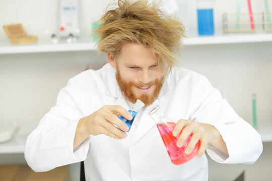 Mad Scientist Mixing Coloured Liquids