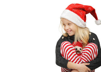 Cute little girl in a Santa hat is very surprised and excited ,mysterious looking at something on white background . Isolated object. Christmas holiday