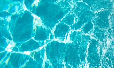blue color background of swimming pool water with ripples in caribbean