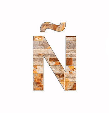Alphabet letter Ñ on tile background - Veneer texture