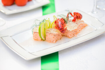 Fish dish with slice of lime, jelly and crayfish