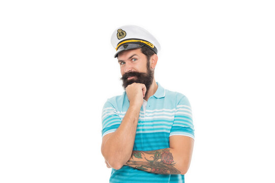 Happy captain propping chin. Bearded man wearing captain hat. Man captain isolated on white