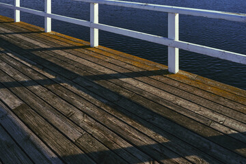 a wooden pier by lake mjøsa