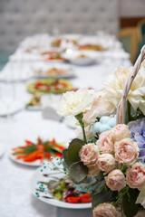 Obraz na płótnie Canvas sandwiches and snacks on a table with a white table, a festive table
