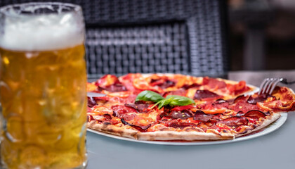 Devil's pizza and light beer