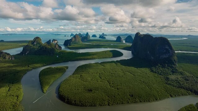 4K Hyperlapse aerial view drone flying over mangrove forest and mountain peak of Phang nga bay, Thailand
