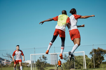 Soccer players, jumping and soccer field team playing competitive sports with energy, passion and...