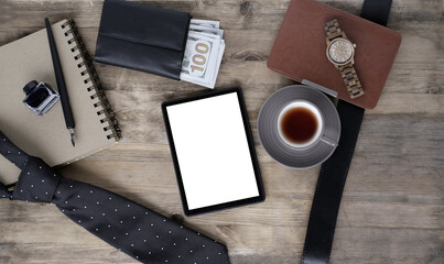 empty blank for text, black tie, cup of tea, coffee, money American dollars in a purse, wrist watch, e-book in a leather case, headphones, top view on items, men's style concept, father's day gift