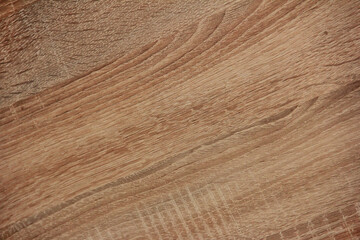texture of brown wood with dark and light stripes and veins