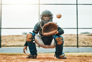 Baseball, catch and sports at the pitch for game, point or score with the ball on a field in the...