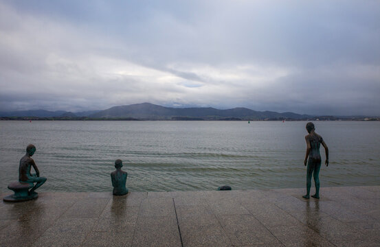 Santander, Cantabria, Spain - January 25, 2019: Los Raqueros Bay Sculptures by spanish artist Jose Cobo in Santander. Detail of statue of the raqueros in spanish port Santander