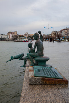 Santander, Cantabria, Spain - January 25, 2019: Los Raqueros Bay Sculptures by spanish artist Jose Cobo in Santander. Detail of statue of the raqueros in spanish port Santander
