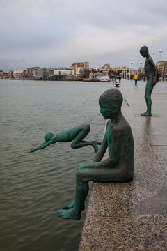 Santander, Cantabria, Spain - January 25, 2019: Los Raqueros Bay Sculptures by spanish artist Jose Cobo in Santander. Detail of statue of the raqueros in spanish port Santander