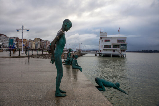 Santander, Cantabria, Spain - January 25, 2019: Los Raqueros Bay Sculptures by spanish artist Jose Cobo in Santander. Detail of statue of the raqueros in spanish port Santander