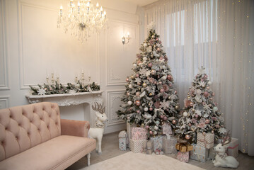 Christmas background with Christmas tree, sofa, fireplace and gifts.