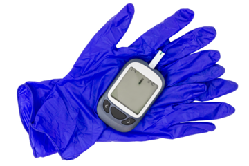 Glucometer on blue medical gloves. Blood sugar control. Fight against diabetes.