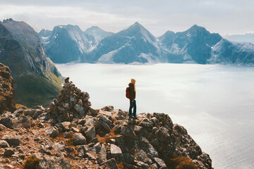 Hiker woman traveling in Norway adventure active vacations outdoor healthy lifestyle trip aerial...