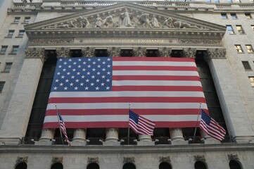 Low-angle shot of the New York Stock Exchange building's facade. USA.