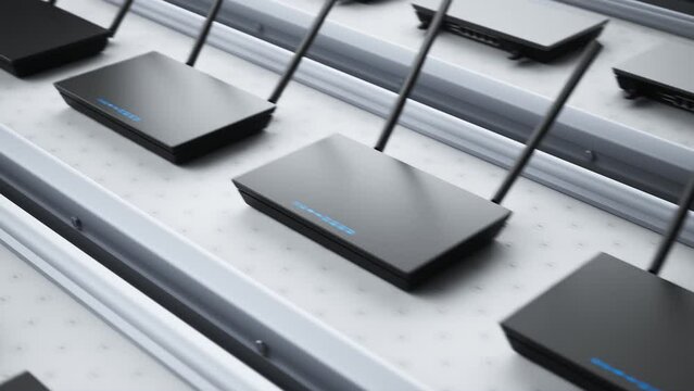 Conveyor belt with routers. Production line of modern networking devices.